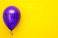purple-balloon-against-yellow-background-2534579-1.jpg